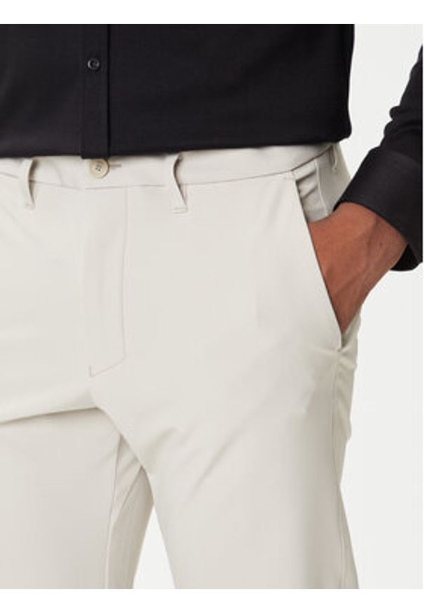 BOSS Spodnie materiałowe T_Commuter 50534303 Beżowy Slim Fit. Kolor: beżowy. Materiał: syntetyk
