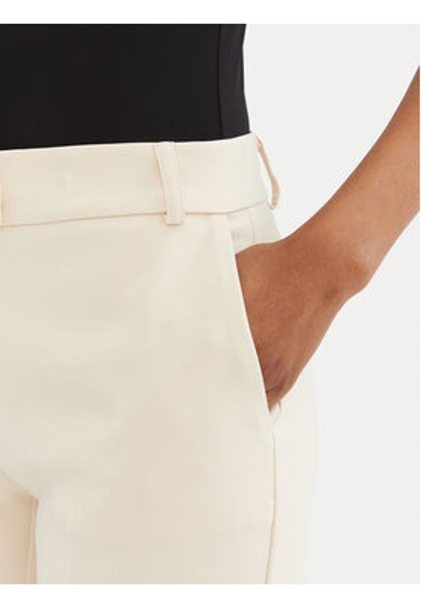 Rinascimento Spodnie materiałowe CFC0122741003 Beżowy Regular Fit. Kolor: beżowy. Materiał: syntetyk