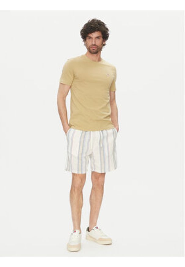 Tommy Jeans Szorty materiałowe DM0DM21948 Écru Regular Fit. Materiał: bawełna