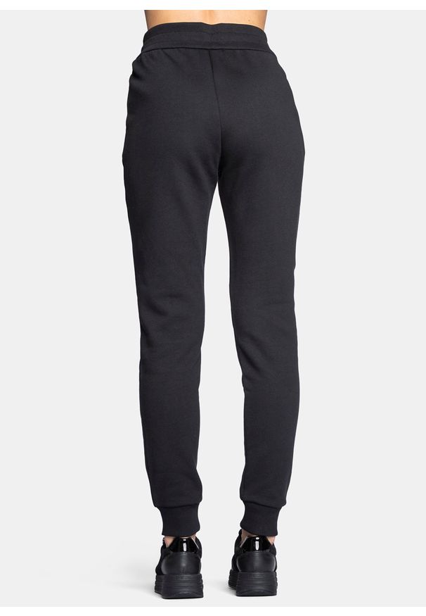 Spodnie dresowe damskie czarne Armani Exchange 8NYPBA YJE5Z 1200. Kolor: czarny. Materiał: dresówka