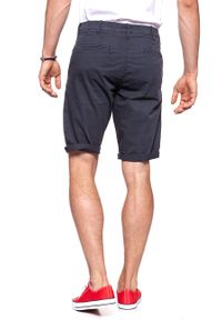 Wrangler - KRÓTKIE SPODENKI WRANGLER CHINO SHORTS NAVY W14MLL49I. Długość: krótkie. Styl: klasyczny #8