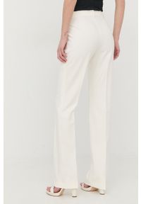 Marciano Guess spodnie damskie kolor beżowy proste medium waist. Okazja: na co dzień. Kolor: beżowy. Materiał: tkanina. Styl: casual #3