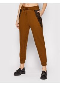 BOSS - Spodnie dresowe Boss. Kolor: brązowy. Materiał: dresówka #1