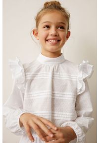 Mango Kids - Bluzka bawełniana dziecięca Yvette 116-164 cm. Okazja: na co dzień. Typ kołnierza: kołnierzyk stójkowy. Kolor: biały. Materiał: bawełna. Długość: długie. Wzór: gładki. Styl: elegancki, casual #1
