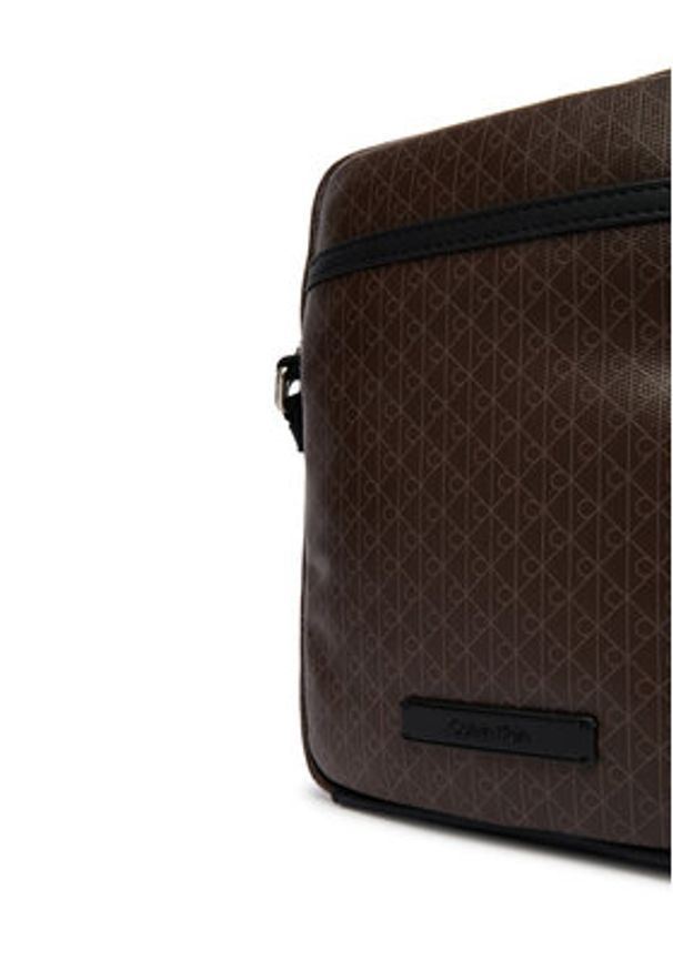 Calvin Klein Saszetka Emblem Aop Coated Slim Reporter LV04D3334G Brązowy. Kolor: brązowy. Materiał: skóra