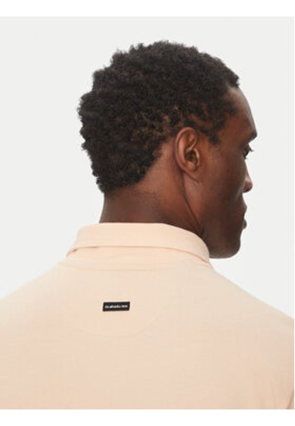 Quiksilver Polo EQYKT04375 Pomarańczowy Regular Fit. Typ kołnierza: polo. Kolor: pomarańczowy. Materiał: bawełna