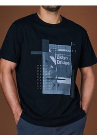 Sinsay - Koszulka - czarny. Kolor: czarny. Materiał: bawełna. Długość rękawa: krótki rękaw. Długość: krótkie. Wzór: nadruk