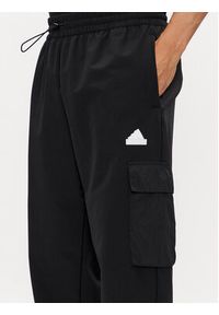 Adidas - adidas Spodnie dresowe City Escape IR5179 Czarny Regular Fit. Kolor: czarny. Materiał: syntetyk #6