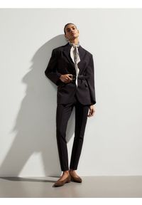 Reserved - Spodnie z przeszyciem - brązowy. Kolor: brązowy. Materiał: tkanina, wiskoza #1