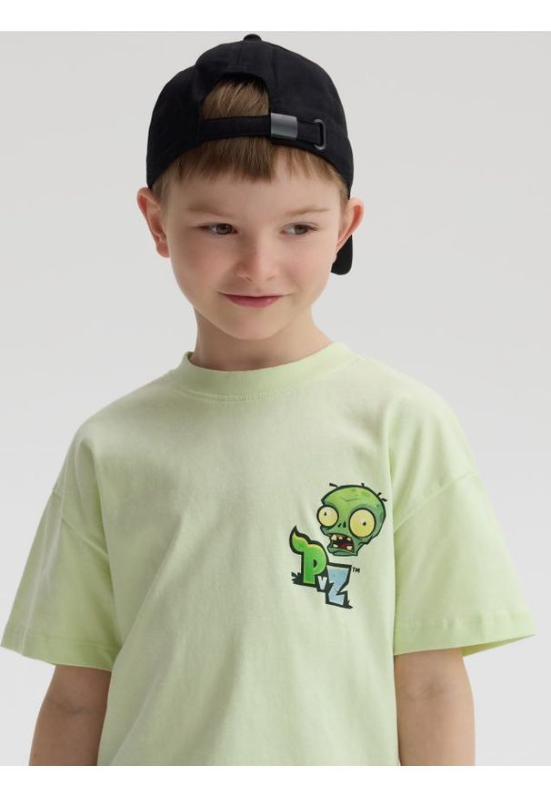 Reserved - T-shirt z nadrukiem PLANTS VS ZOMBIES - jasnozielony. Kolor: zielony. Materiał: dzianina, bawełna. Wzór: nadruk