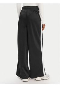 Reebok Spodnie dresowe Dianne RK25512CCW Czarny Relaxed Fit. Kolor: czarny. Materiał: syntetyk #5