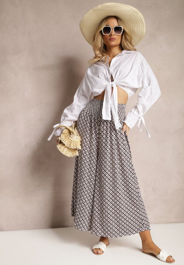 Renee - Czarno-Beżowe Spodnie High Waist z Bawełny z Rozszerzanymi Nogawkami i Gumką Nereialla. Stan: podwyższony. Kolor: czarny. Materiał: bawełna. Wzór: aplikacja