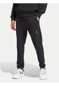 Adidas - adidas Spodnie dresowe ALL SZN French Terry IV5216 Czarny Loose Fit. Kolor: czarny. Materiał: bawełna