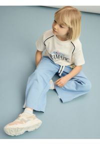 Reserved - Dresowe spodnie z lampasem - niebieski. Kolor: niebieski. Materiał: dresówka #1