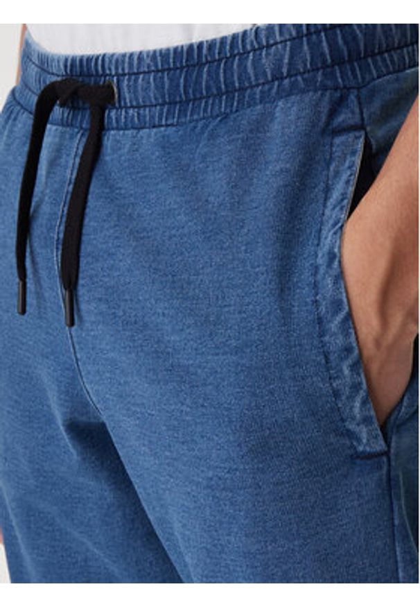 Reebok Spodnie dresowe Ambrose RK25543CCM Niebieski Regular Fit. Kolor: niebieski. Materiał: bawełna