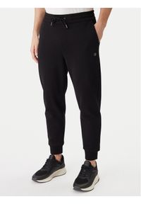 BOSS Spodnie dresowe 50555853 Czarny Regular Fit. Kolor: czarny. Materiał: bawełna #1