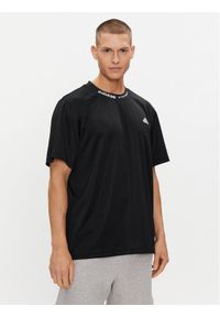 Adidas - adidas T-Shirt IJ6460 Czarny Loose Fit. Kolor: czarny. Materiał: syntetyk #1