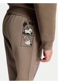 adidas Spodnie dresowe Adidas Disney Mickey Mouse KS3955 Beżowy Regular Fit. Kolor: beżowy. Materiał: syntetyk. Wzór: motyw z bajki #7