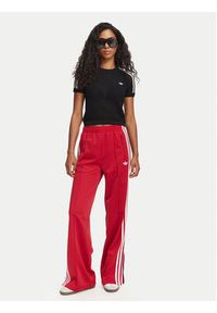 Adidas - adidas Spodnie dresowe Firebird Loose Tracksuit KS4670 Czerwony Loose Fit. Kolor: czerwony. Materiał: syntetyk #4