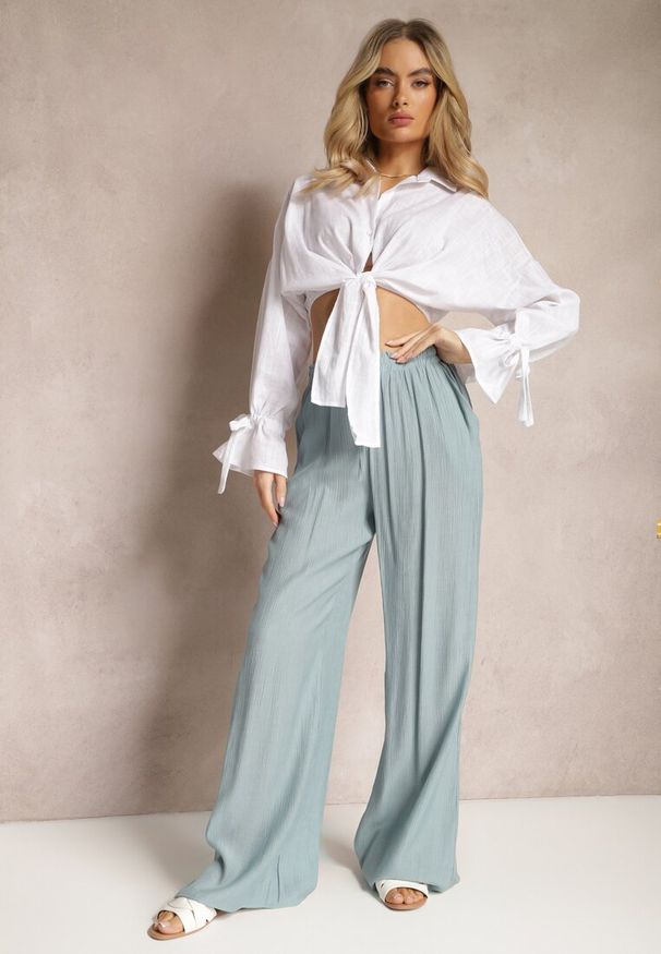 Renee - Jasnoniebieskie Szerokie Spodnie z Wiskozy i Gumką w Pasie Abyga. Okazja: na co dzień. Kolor: niebieski. Materiał: wiskoza. Styl: casual, sportowy