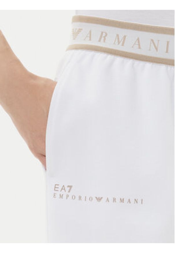 EA7 Emporio Armani Spodnie dresowe 7W000281 AF12501 U0002 Beżowy Regular Fit. Kolor: beżowy. Materiał: syntetyk