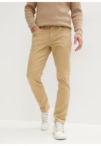 bonprix - Dżinsy ze stretchem Slim Fit Straight. Kolor: beżowy