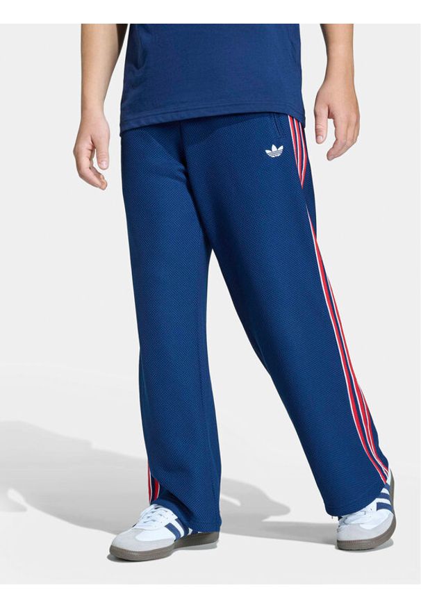 Adidas - adidas Spodnie dresowe Firebird Double Knit KD7825 Granatowy Loose Fit. Kolor: niebieski. Materiał: syntetyk