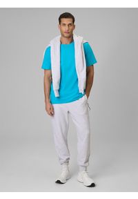 4f - 4F T-shirt regular gładki męski - niebieski L. Okazja: na co dzień. Kolor: niebieski. Materiał: materiał. Wzór: gładki. Styl: casual, klasyczny #2