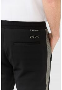 La Martina - LA MARTINA Czarne męskie spodnie Slim Fit, Rozmiar L. Kolor: czarny. Materiał: poliester