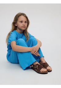 Reserved - Strukturalny kombinezon - jasnoniebieski. Kolor: niebieski. Materiał: dzianina