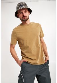 Armani Exchange - T-shirt ARMANI EXCHANGE. Materiał: bawełna. Długość rękawa: krótki rękaw. Długość: krótkie. Wzór: aplikacja