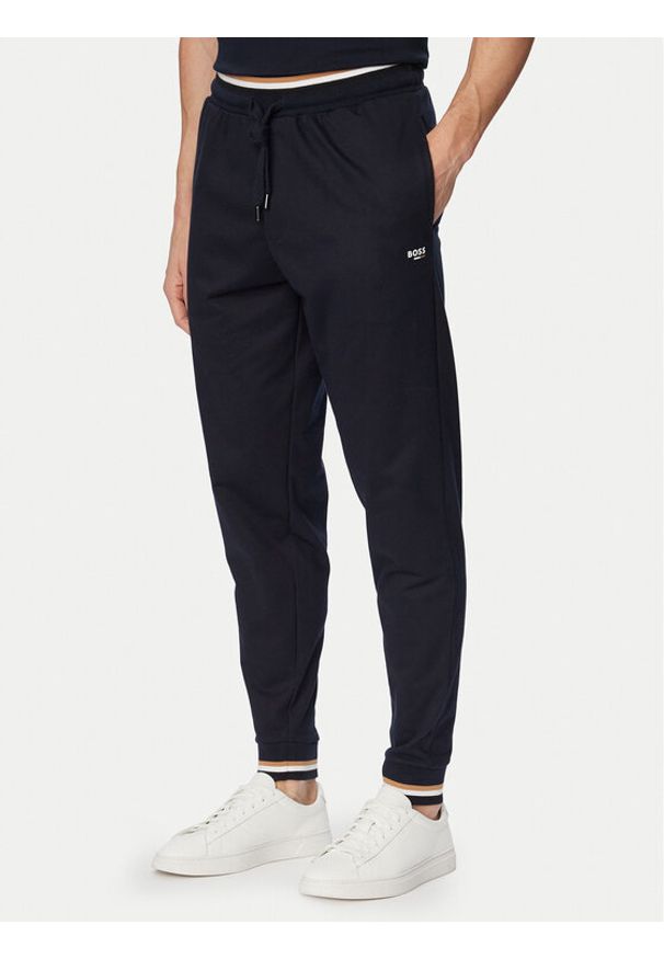 BOSS Spodnie dresowe Iconic 50554830 Granatowy Regular Fit. Kolor: niebieski. Materiał: bawełna