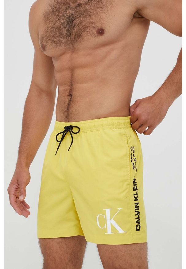 Calvin Klein szorty kąpielowe kolor żółty. Kolor: żółty. Materiał: poliester