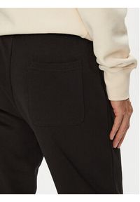 Tommy Jeans Spodnie dresowe Dna Graphic DM0DM22145 Czarny Slim Fit. Kolor: czarny. Materiał: bawełna #5