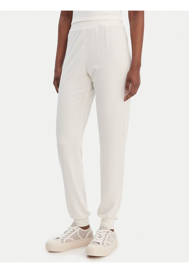 Guess Spodnie dresowe O6GB01 KCQP2 Écru Regular Fit. Materiał: syntetyk