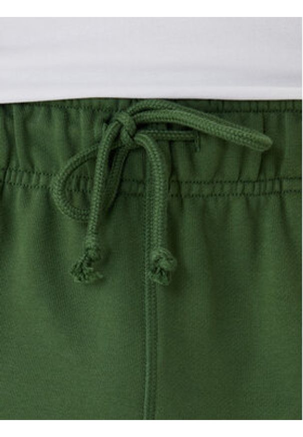 New Balance Spodnie dresowe MP41508 Zielony Relaxed Fit. Kolor: zielony. Materiał: bawełna