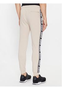 Guess Spodnie dresowe Z2YB19 K6ZS1 Beżowy Regular Fit. Kolor: beżowy. Materiał: bawełna #2