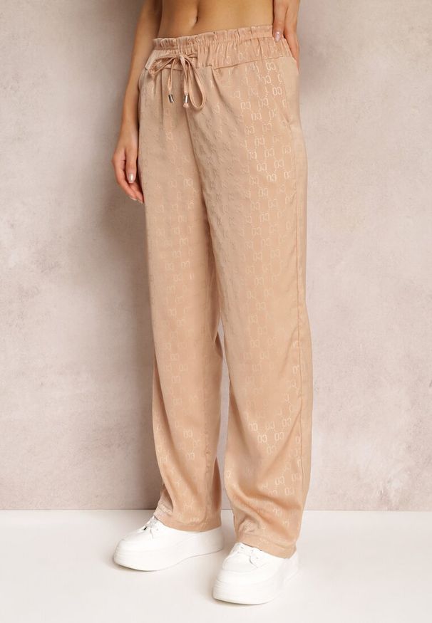 Renee - Ciemnobeżowe Spodnie z Wysokim Stanem i Szerokimi Nogawkami Niriki. Stan: podwyższony. Kolor: beżowy. Długość: długie