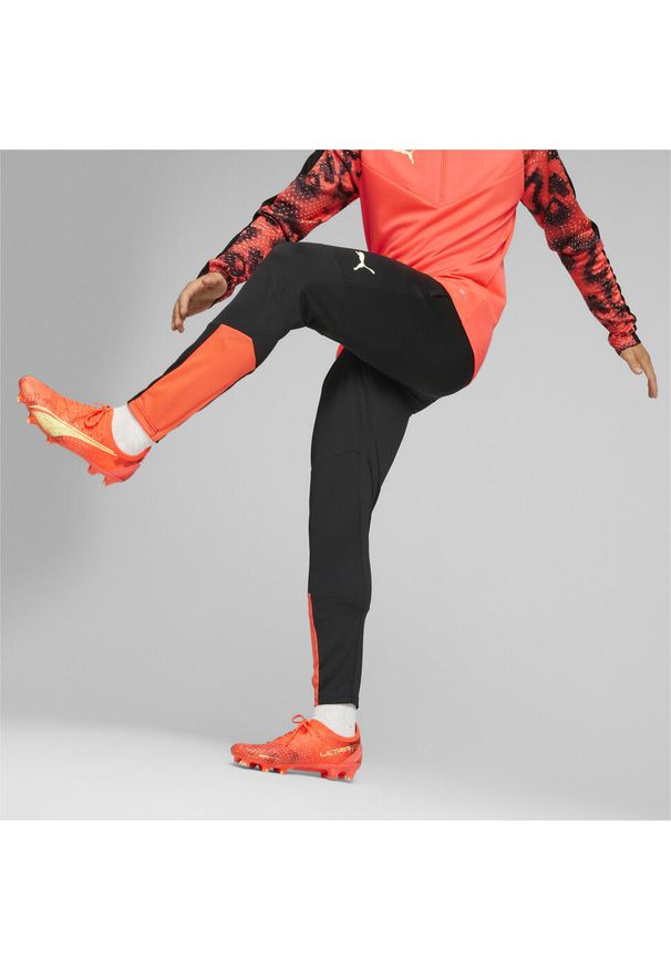 Spodnie Puma Individualfinal Training Pants, Mężczyźni. Kolor: czarny, pomarańczowy, wielokolorowy. Materiał: poliester, materiał. Sport: piłka nożna