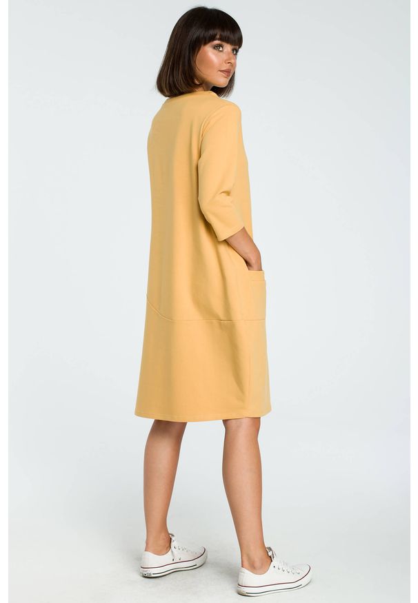BeWear - Sukienka dresowa bombka oversize z kieszonką z przodu żółta. Okazja: na co dzień. Kolor: żółty. Materiał: dresówka. Typ sukienki: bombki, oversize. Styl: casual