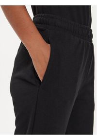Fila Spodnie dresowe FAW0700 Czarny Regular Fit. Kolor: czarny. Materiał: bawełna #5