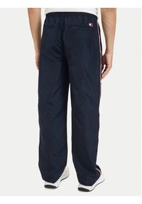 Tommy Jeans Spodnie dresowe DM0DM23123 Granatowy Relaxed Fit. Kolor: niebieski. Materiał: syntetyk #4
