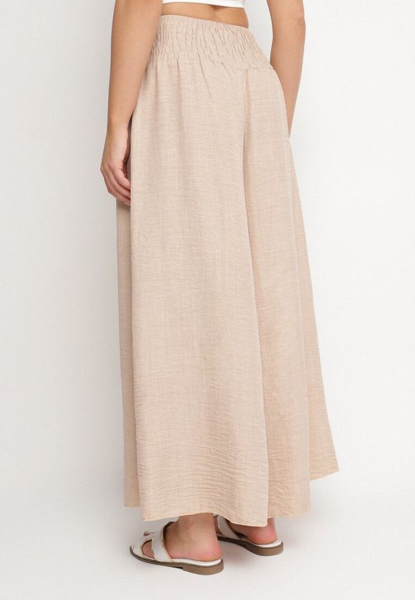Born2be - Beżowe Spodnie Szerokie z Szeroką Gumką w Talii Koririelle. Okazja: na co dzień. Kolor: beżowy. Styl: elegancki, casual