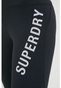 Superdry legginsy damskie kolor czarny z nadrukiem. Kolor: czarny. Materiał: skóra, materiał. Wzór: nadruk #2