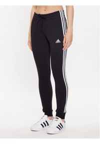 Adidas - adidas Spodnie dresowe HZ5753 Czarny Slim Fit. Kolor: czarny. Materiał: bawełna