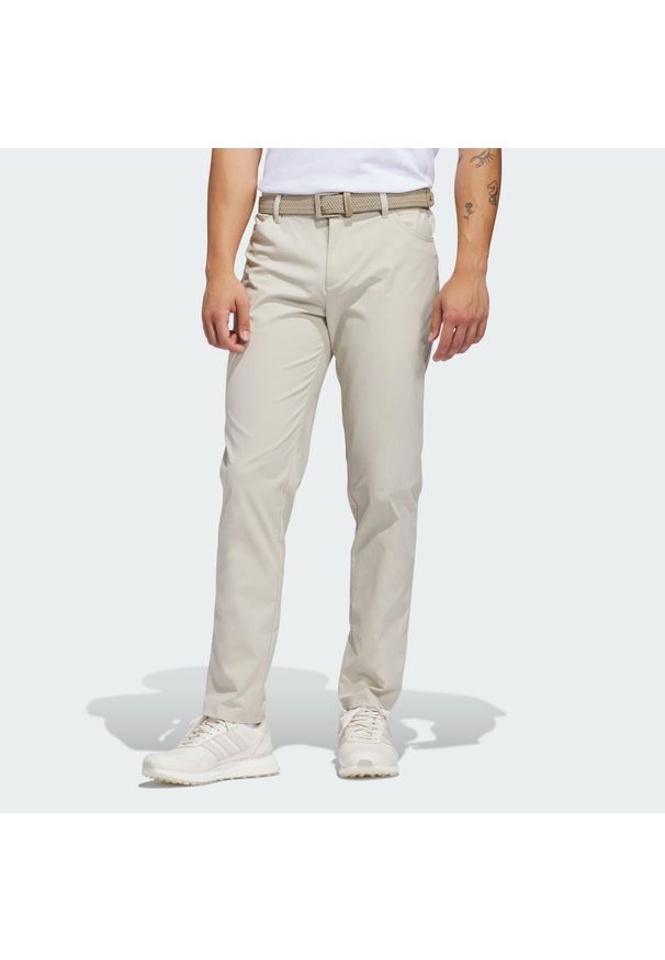 Adidas - Spodnie Mens Ultimate365 5-Pocket. Kolor: beżowy. Sport: golf