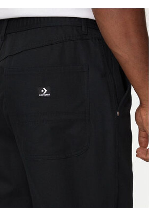 Converse Spodnie materiałowe M Converse Woven Pant 10026010-A02 Czarny Relaxed Fit. Kolor: czarny. Materiał: bawełna