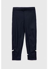 Adidas - adidas spodnie dresowe dziecięce B D4GMDY kolor granatowy z nadrukiem. Kolor: niebieski. Materiał: dresówka. Wzór: nadruk #1