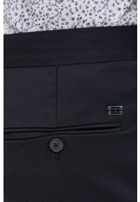 TOMMY HILFIGER - Tommy Hilfiger spodnie wełniane męskie kolor granatowy dopasowane. Kolor: niebieski. Materiał: wełna