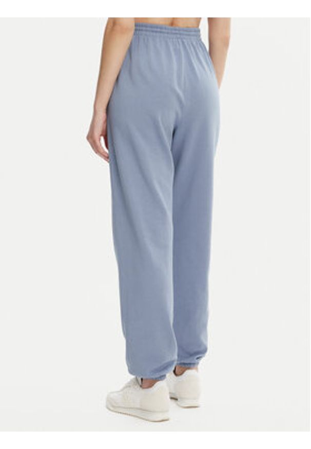 TOMMY HILFIGER - Tommy Hilfiger Spodnie dresowe UW0UW05793 Niebieski Regular Fit. Kolor: niebieski. Materiał: bawełna